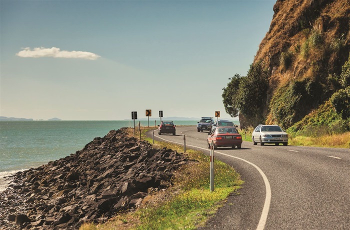 Cars driving on thames coast road.jpeg